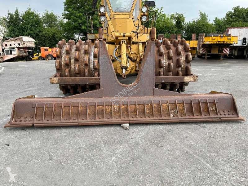 Compactador Caterpillar  825 + porte engins