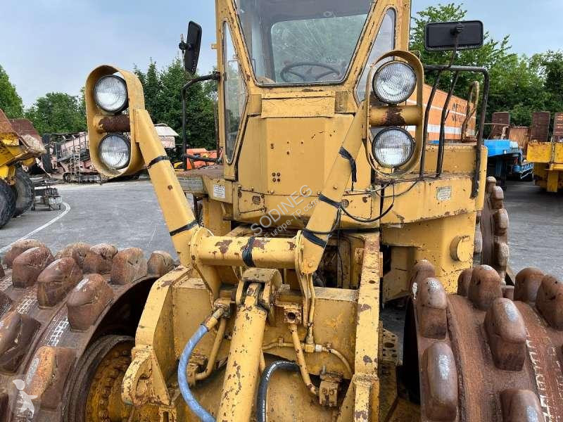 Compactador Caterpillar  825 + porte engins