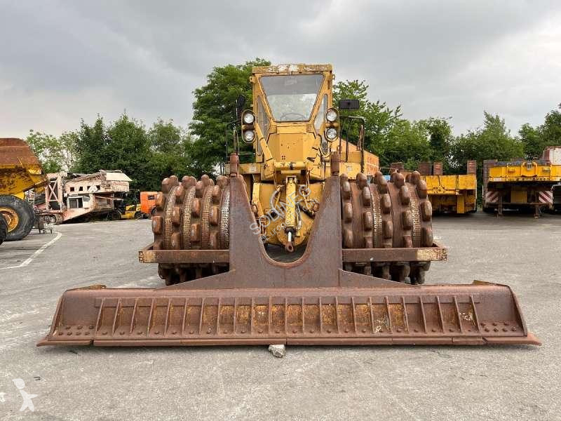 Compactador Caterpillar  825 + porte engins