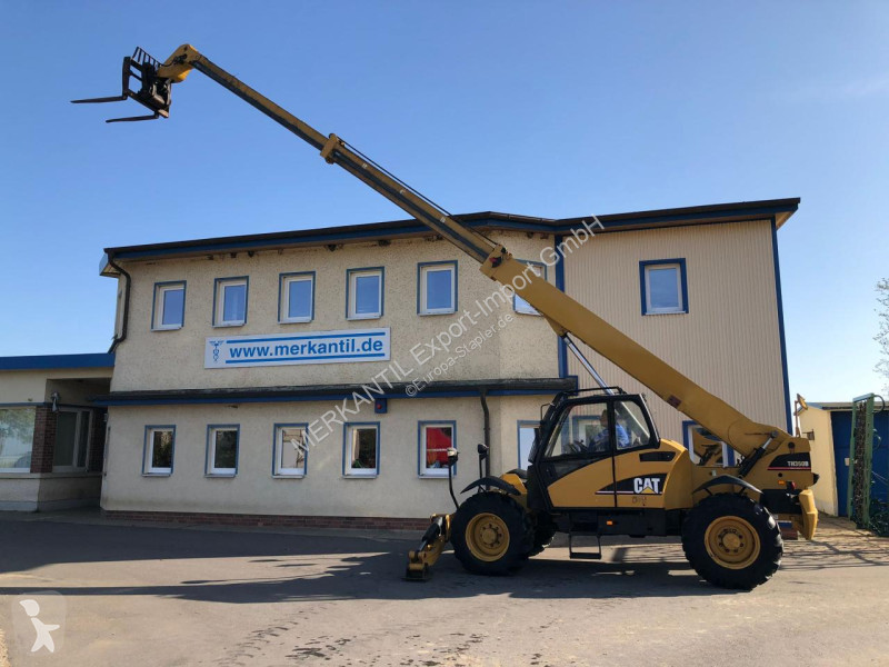 Телескопический погрузчик Caterpillar 360B 13m...