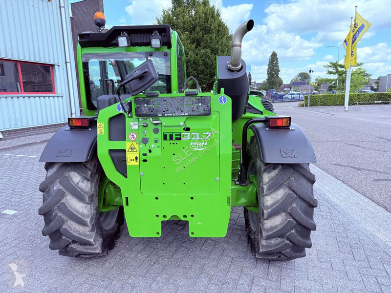 Încărcător telescopic Merlo TF33.7 115G...
