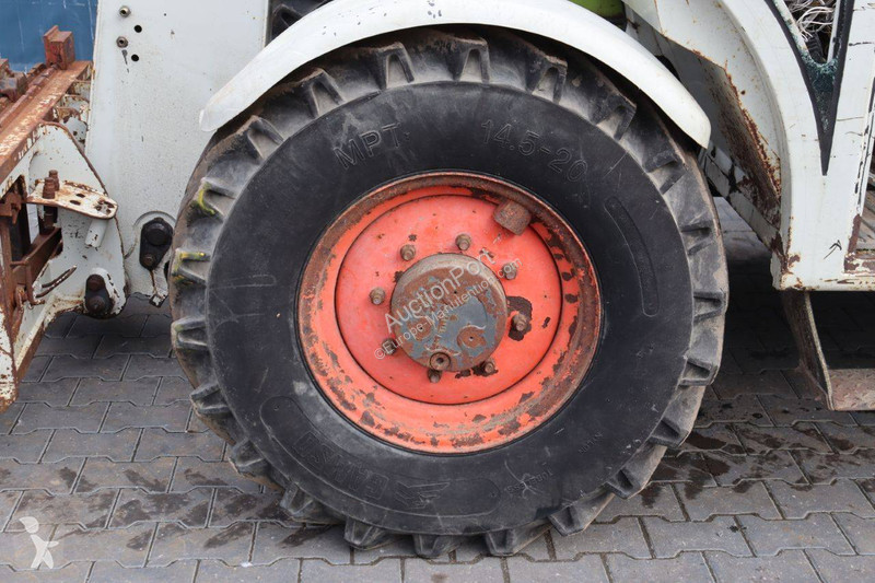 Телескопический погрузчик Caterpillar 506