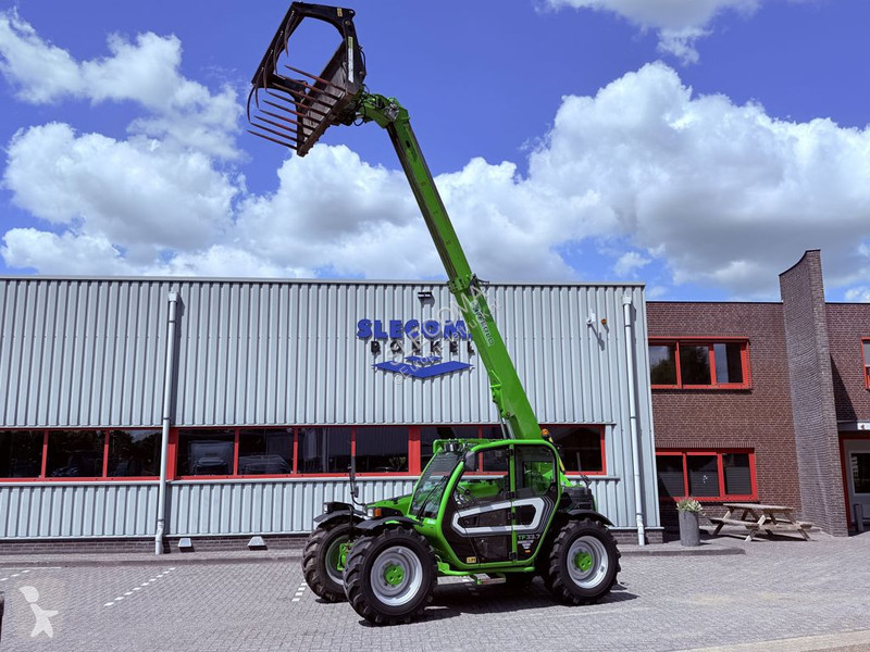 Încărcător telescopic Merlo TF33.7 115G...