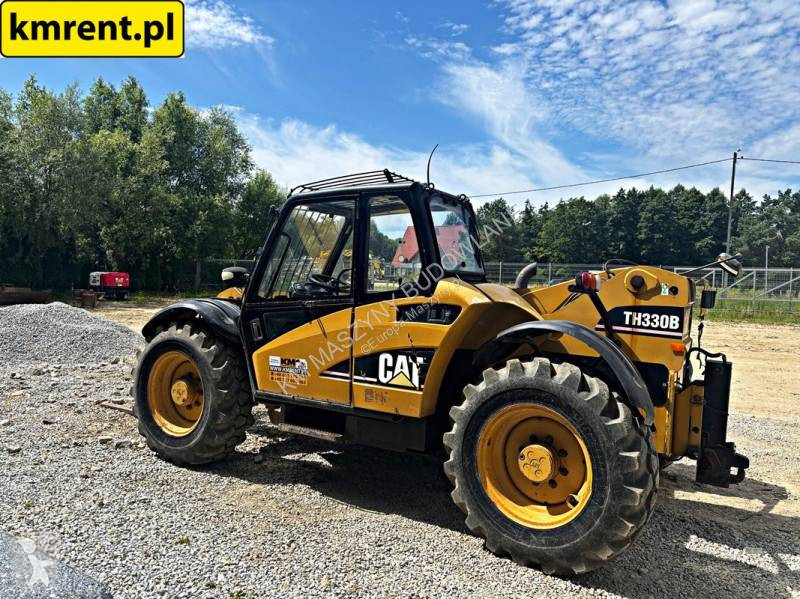 رافعة شوكية تلسكوبية Caterpillar TH330B...