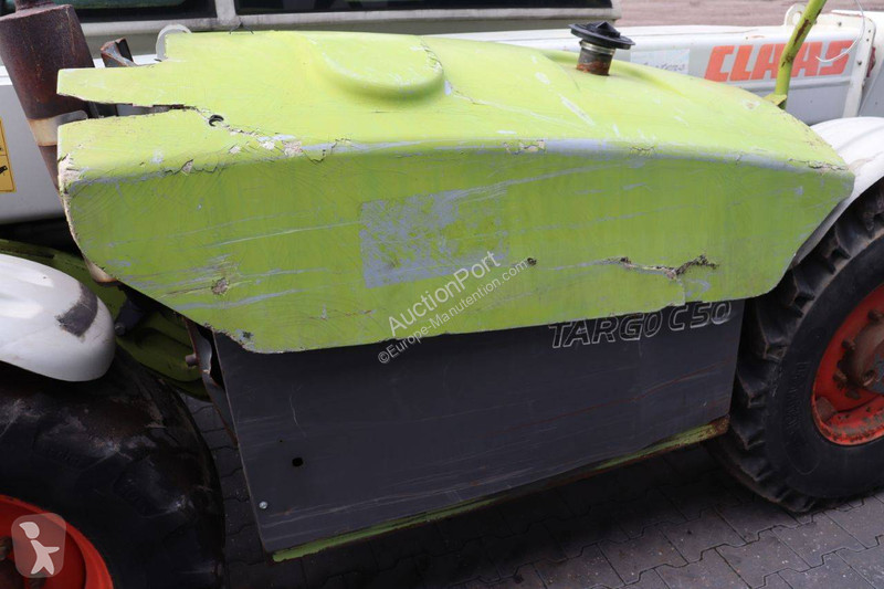 Телескопический погрузчик Caterpillar 506