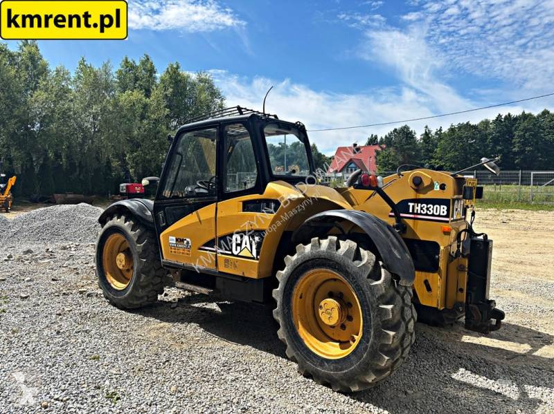 رافعة شوكية تلسكوبية Caterpillar TH330B...