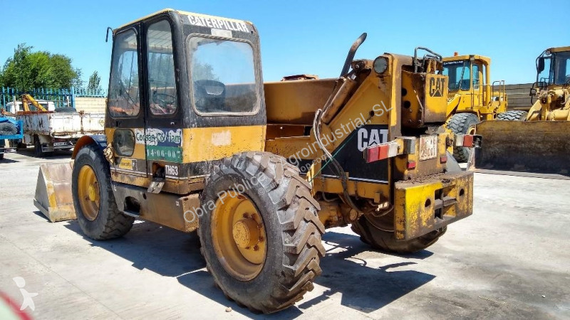 رافعة شوكية تلسكوبية Caterpillar TH63