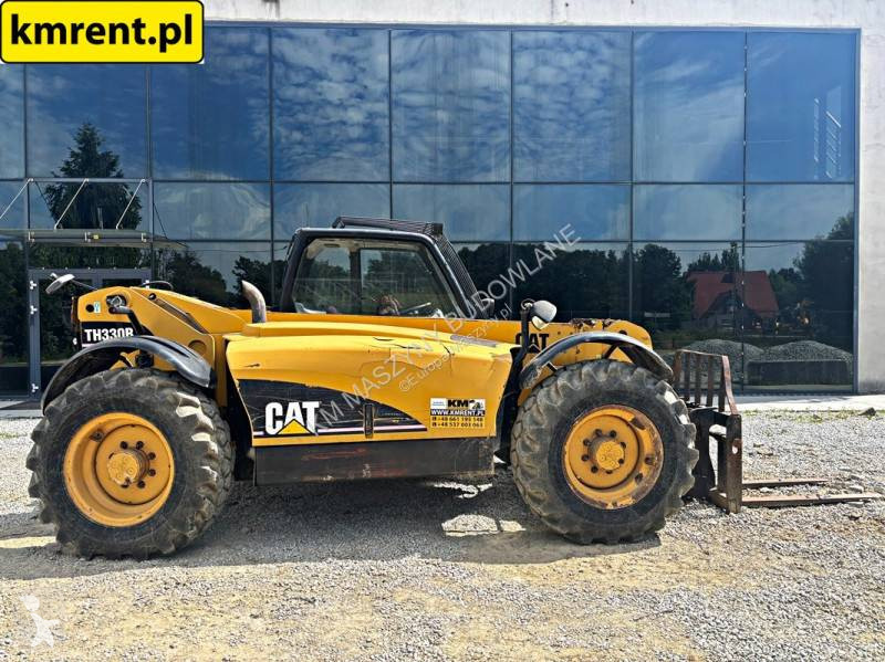 رافعة شوكية تلسكوبية Caterpillar TH330B...
