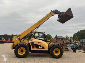 Телескопічний навантажувач Caterpillar TH414