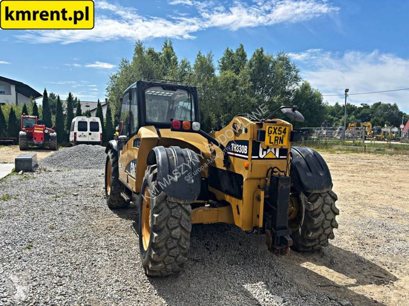 رافعة شوكية تلسكوبية Caterpillar TH330B...