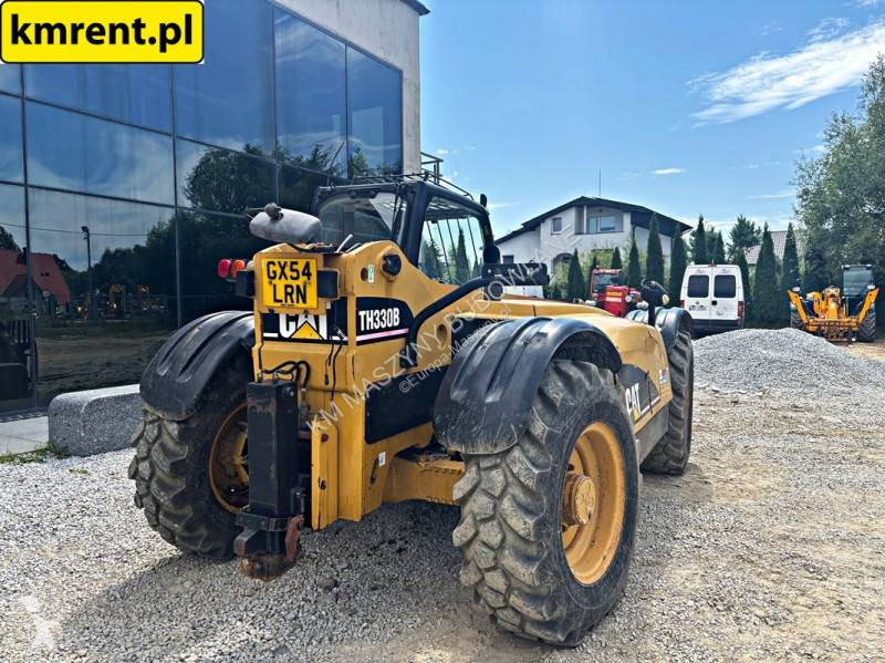 رافعة شوكية تلسكوبية Caterpillar TH330B...