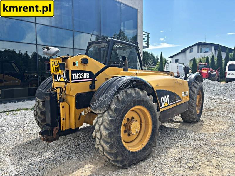 رافعة شوكية تلسكوبية Caterpillar TH330B...