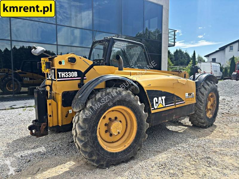 رافعة شوكية تلسكوبية Caterpillar TH330B...