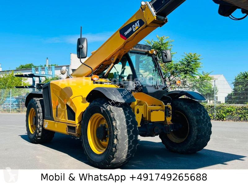 رافعة شوكية تلسكوبية Caterpillar TH408D...