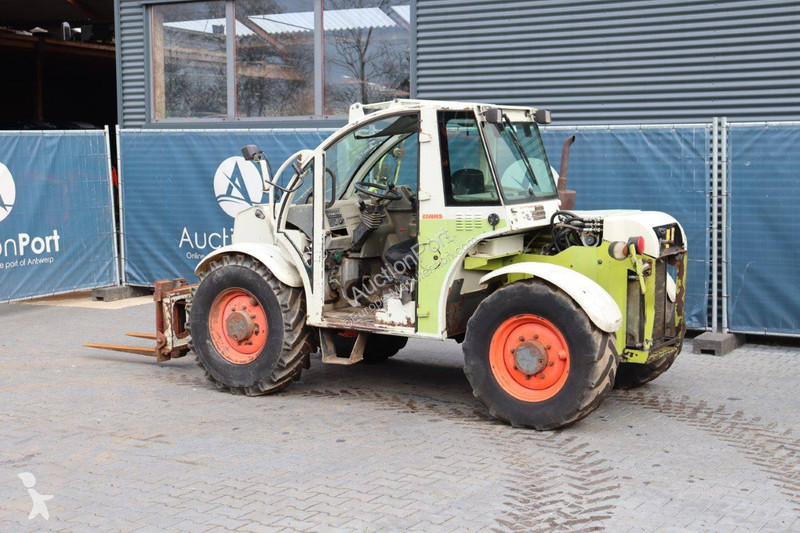 Телескопический погрузчик Caterpillar 506