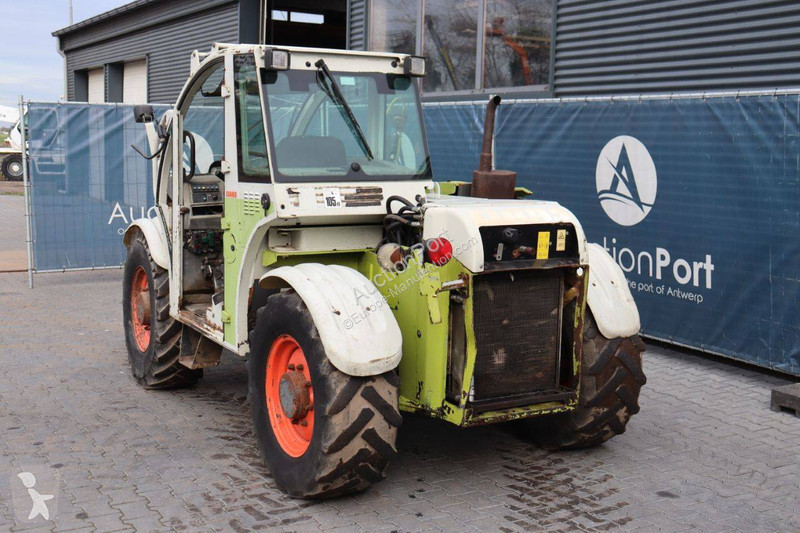 Телескопический погрузчик Caterpillar 506