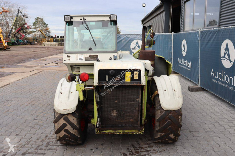 Телескопический погрузчик Caterpillar 506