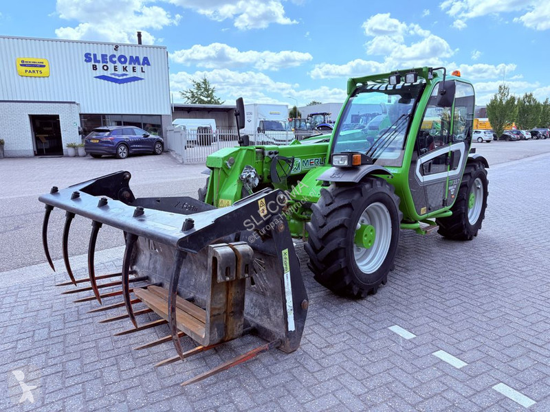 Încărcător telescopic Merlo TF33.7 115G...