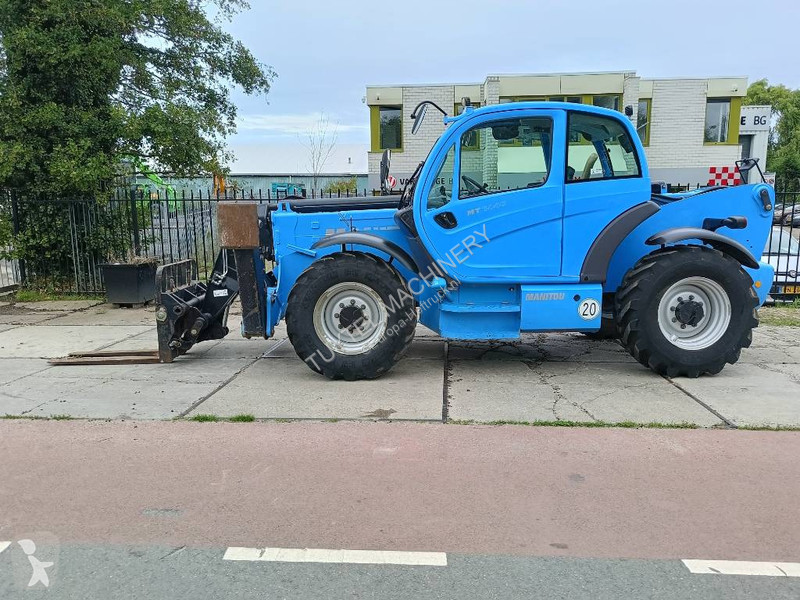 Chariot télescopique Manitou 14 m 4 T verreiker...