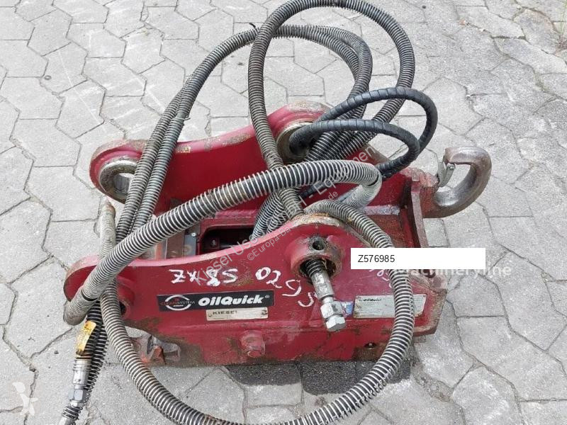 Stavební vybavení Oilquick Attache rapide...