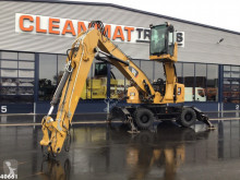 Caterpillar MH 3022 Hydraulisch hefbare cabine pelle de manutention occasion