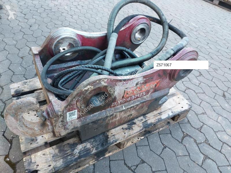 Stavební vybavení Oilquick Attache rapide...