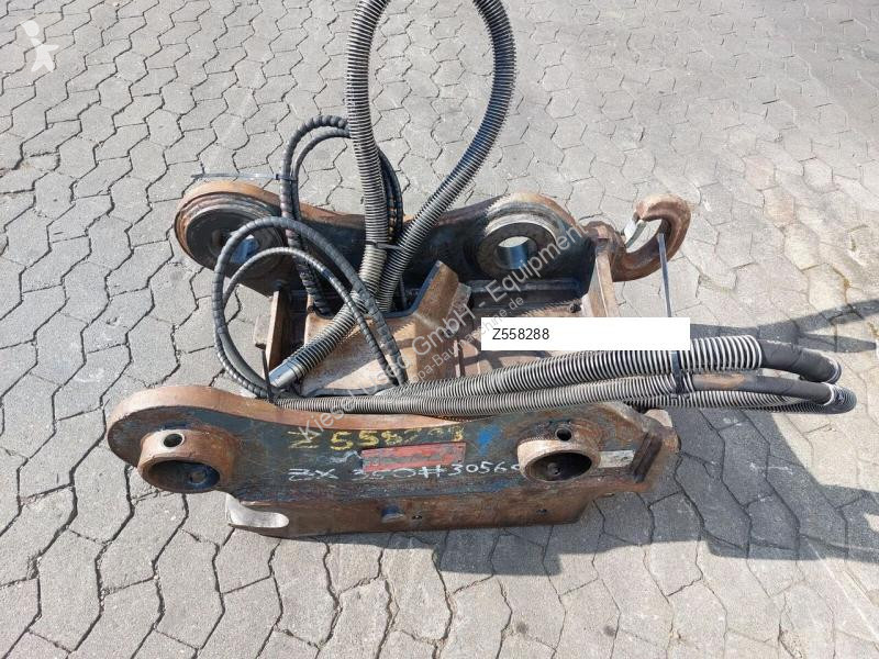 Stavební vybavení Oilquick Attache rapide...