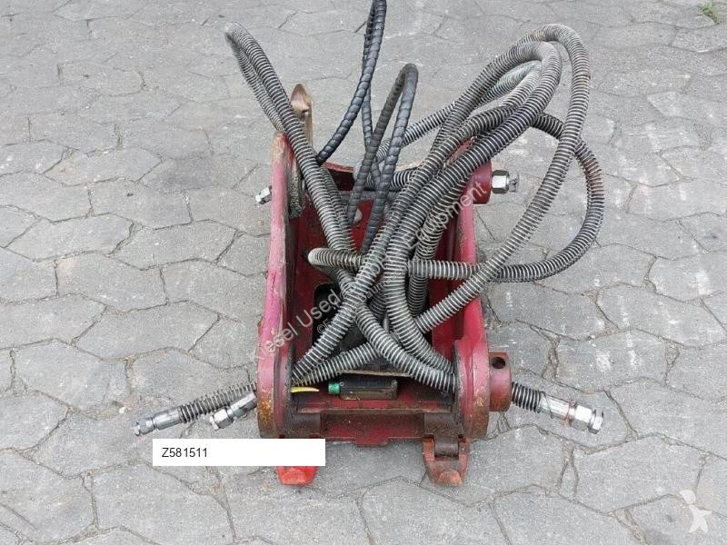 Stavební vybavení Oilquick Attache rapide...