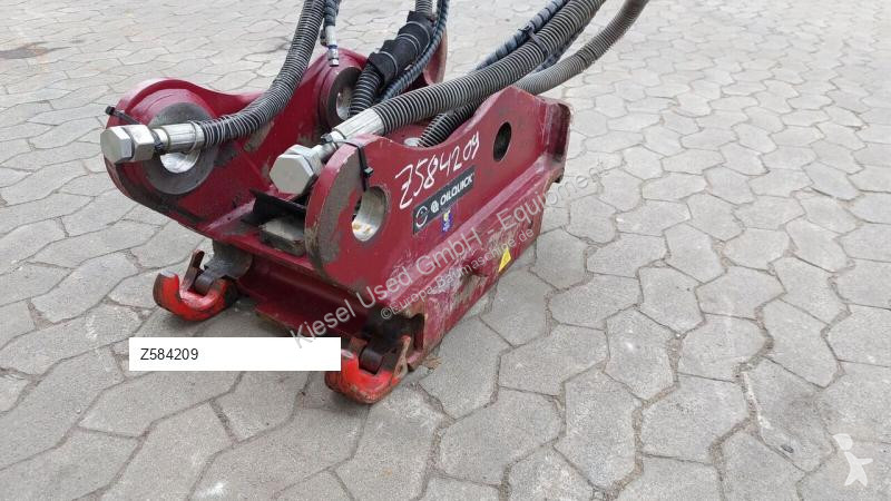 Equipamentos de obras Oilquick Attache rapide...