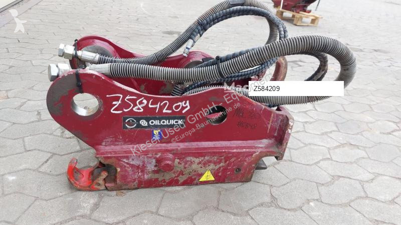 Equipamentos de obras Oilquick Attache rapide...